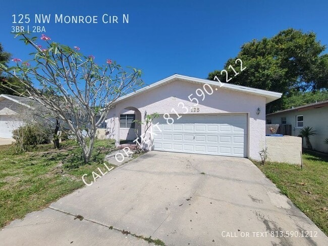 property at 125 NW Monroe Cir N