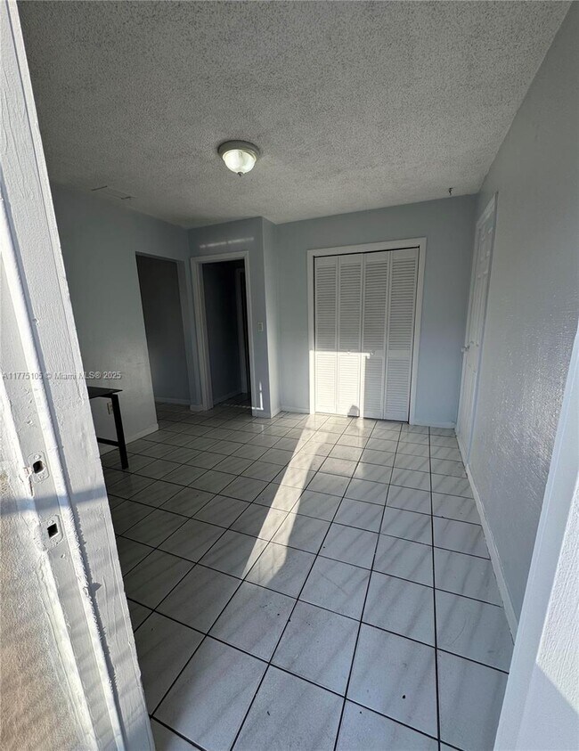 property at 5675 SW 1st St