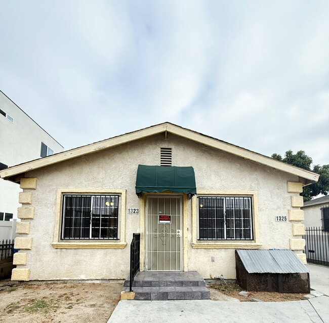 property at 1323 W 58th St