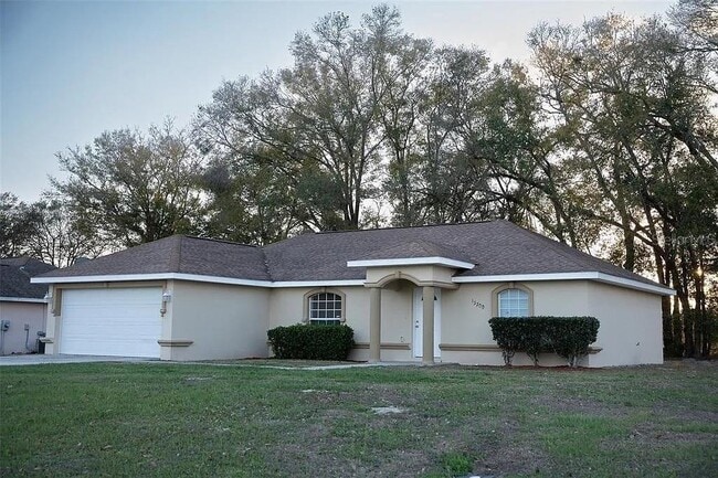 property at 13700 SW 48th Ct