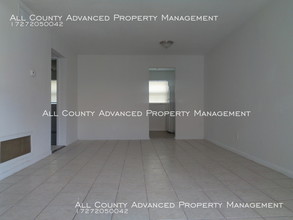 1428 Spring Ln-Unit -4 in Clearwater, FL - Foto de edificio - Building Photo