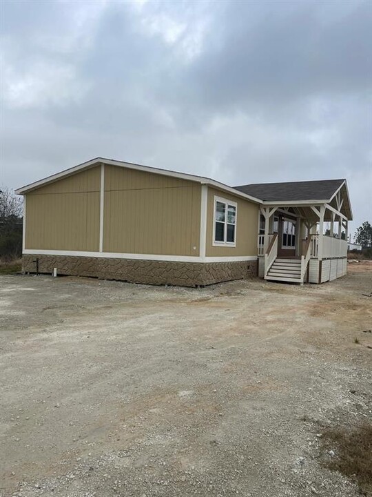 182 Rd 5128 in Cleveland, TX - Building Photo