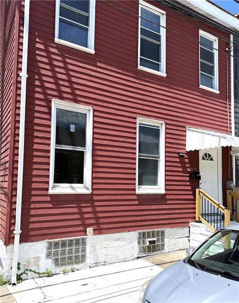 property at 1615 Manhattan St