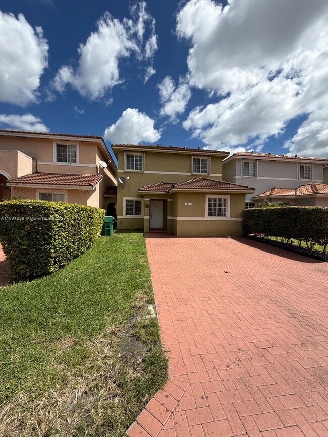 property at 14371 SW 136th Ave
