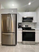 7303 NW 57th Dr in Tamarac, FL - Building Photo - Building Photo