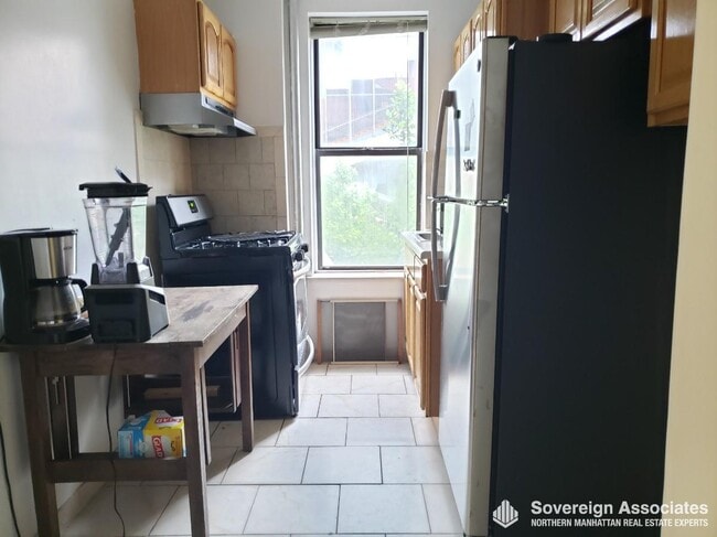 86 Haven Ave, Unit 24 in New York, NY - Foto de edificio - Building Photo