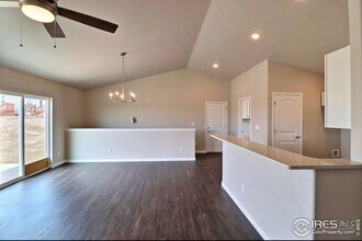 Excellent 3-Bedroom Home in Evans With Great Backyard & Attached Garage! in Evans, CO - Building Photo - Building Photo