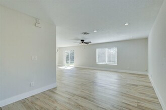 1956 SW Jamesport Dr in Port St. Lucie, FL - Building Photo - Building Photo