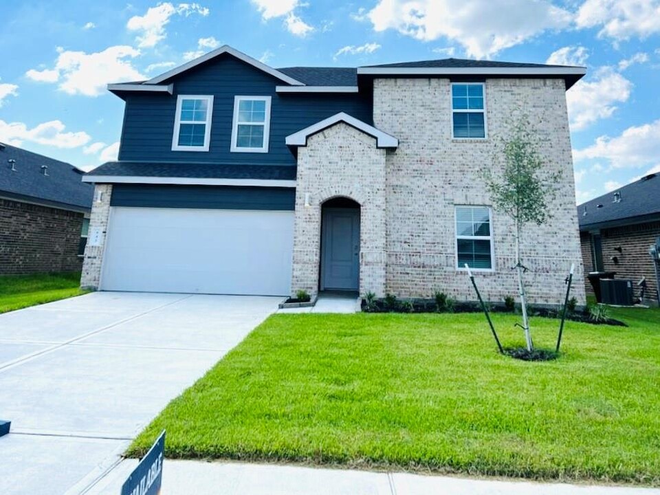 942 Curly Angora Ct in Rosharon, TX - Foto de edificio