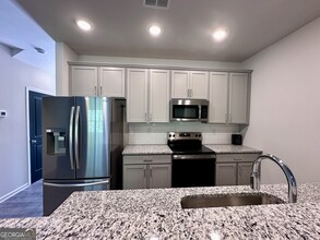7012 Fringe Flower Dr in Austell, GA - Building Photo - Building Photo