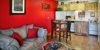 1x1 Living Room & Kitchen - The Standard Raintree Apartments in Tucson, Arizona