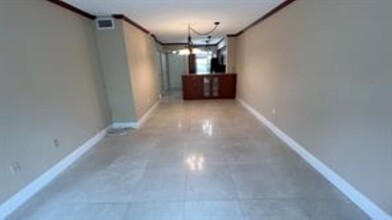 2236 N Cypress Bend Dr, Unit 308 in Pompano Beach, FL - Building Photo - Building Photo