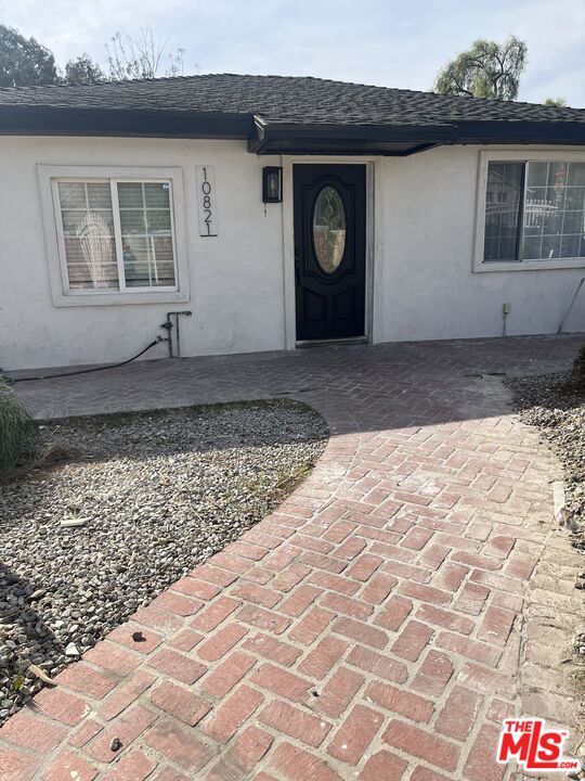 property at 10821 Arleta Ave