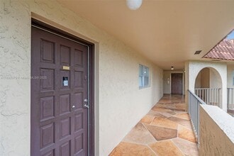 6100 S Falls Cir Dr in Lauderhill, FL - Building Photo - Building Photo