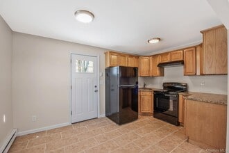 703 Provost Ave in Bellport, NY - Building Photo - Building Photo