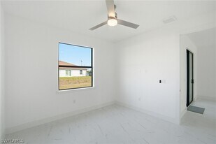 2404-2406 Mae Ave S in Lehigh Acres, FL - Building Photo