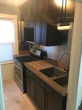 596 S Main St, Unit 1 Rear in Woonsocket, RI - Building Photo - Building Photo