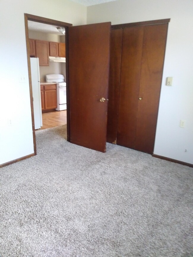 709 John Goodhue Dr, Unit 10 in Carlisle, IA - Foto de edificio - Building Photo