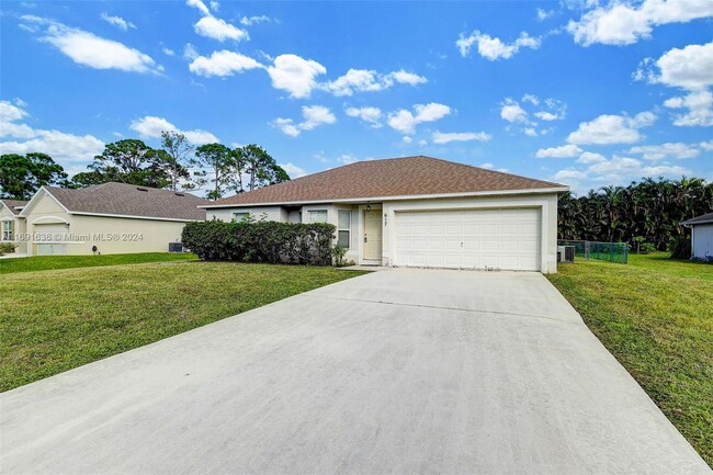 617 NW Cardinal Dr in Port St. Lucie, FL - Building Photo - Building Photo