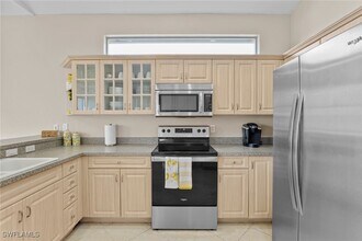 8039 Tauren Ct in Naples, FL - Building Photo - Building Photo