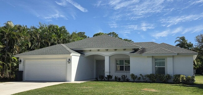 5996 NW Baynard Dr in Port St. Lucie, FL - Building Photo - Building Photo