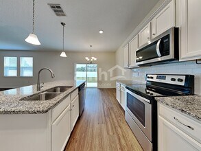 7809 Stumble Journey Ln in Progress Village, FL - Building Photo - Building Photo