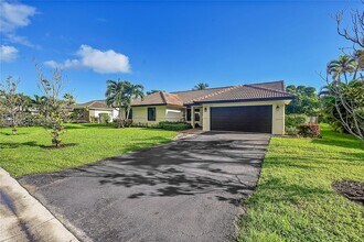 8781 NW 49th Dr in Coral Springs, FL - Building Photo - Building Photo