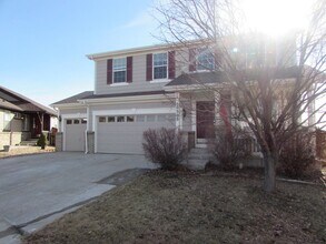 10503 Joplin St in Commerce City, CO - Building Photo - Building Photo