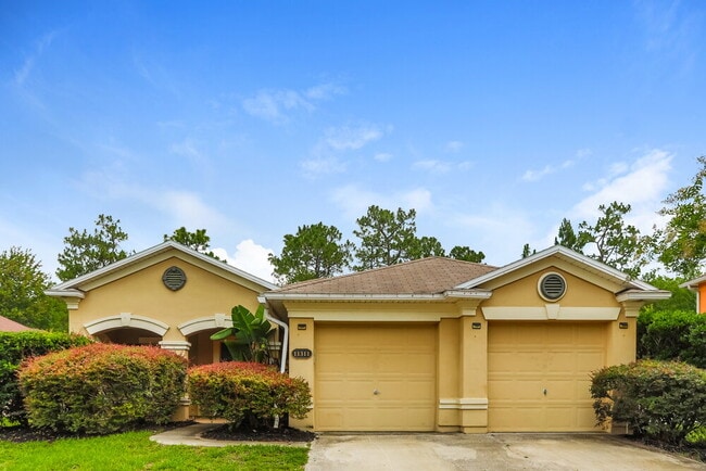 property at 11311 Justin Oaks Dr N