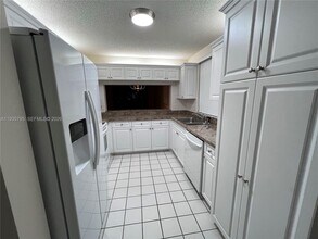 10426 E Clairmont Cir in Tamarac, FL - Building Photo - Building Photo