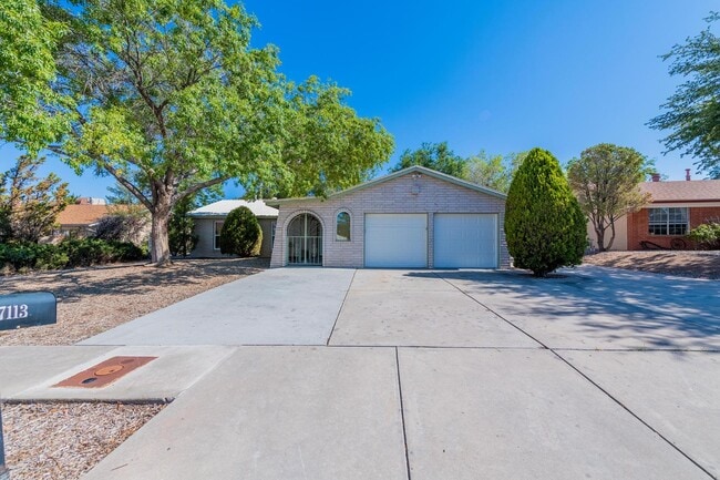 property at 7113 Welton Dr NE