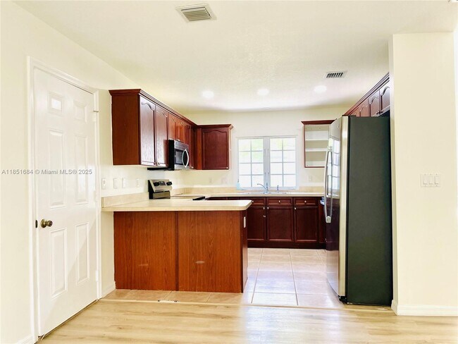 3797 Dove Landing Rd in West Palm Beach, FL - Building Photo - Building Photo
