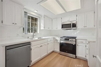 9619 Olive St, Unit 1233 in Bellflower, CA - Building Photo - Building Photo