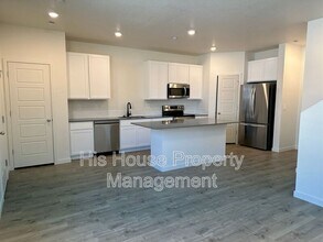 3956 Pinnacles Ct in Evans, CO - Building Photo - Building Photo