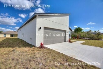 11 Magnolia Ln in Poinciana, FL - Foto de edificio - Building Photo
