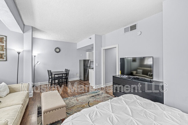 property at 230 E 9th St