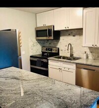 157 Franklin St-Unit -E1 in Stoneham, MA - Building Photo - Building Photo