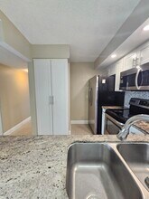 728 Sunny Pine Way in Greenacres, FL - Building Photo - Building Photo