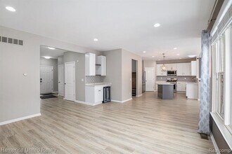 59696 Twin Pines Dr in New Hudson, MI - Building Photo - Building Photo