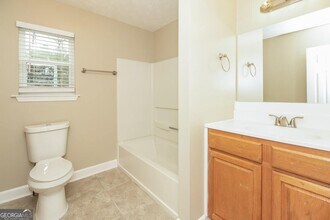 1028 River Stone Ct in Riverdale, GA - Building Photo - Building Photo
