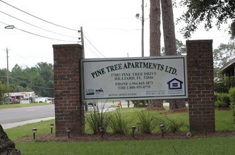 Pine Tree Apartments in Hilliard, FL - Building Photo - Building Photo