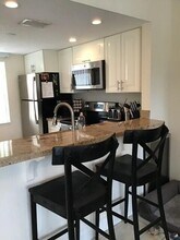 1040 Lake Shore Dr in Lake Park, FL - Building Photo - Building Photo