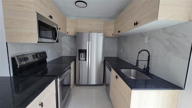 property at 1604 NW 24th Ct