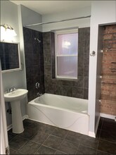 7750 S Essex Ave, Unit Unit 102 in Chicago, IL - Building Photo - Building Photo