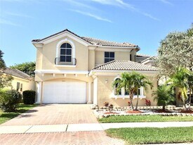 7477 NW 114th Terrace in Parkland, FL - Building Photo