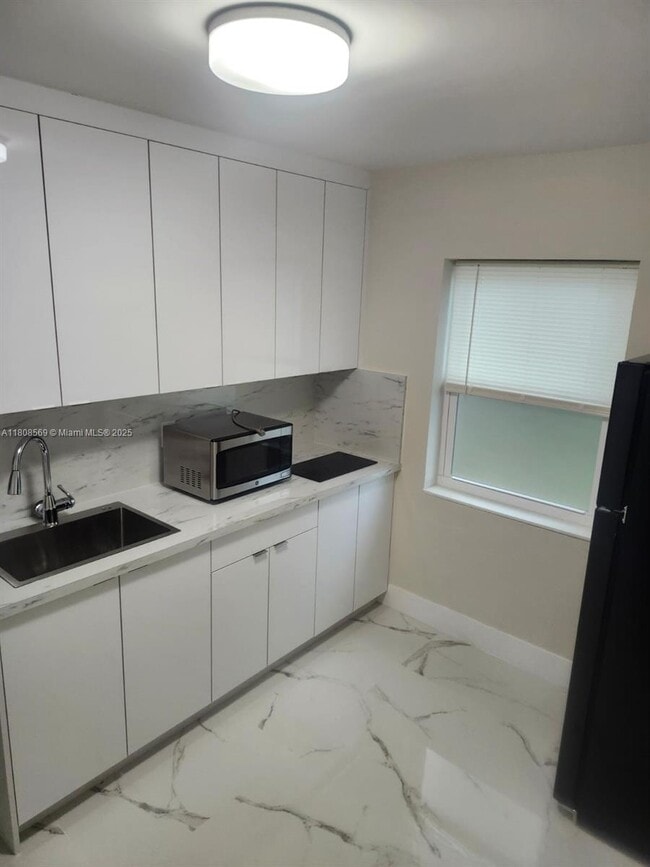 property at 3130 NW 160th St