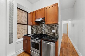 46 Downing St in New York, NY - Building Photo - Building Photo