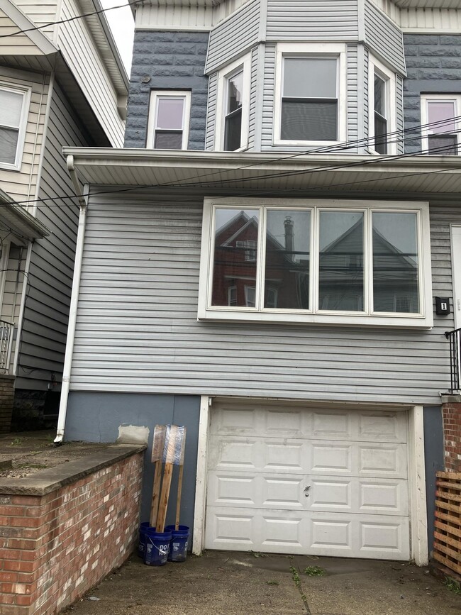 property at 124 W 27th St