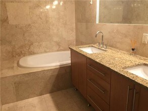 7939 East Dr-Unit -1001 in North Bay Village, FL - Building Photo - Building Photo