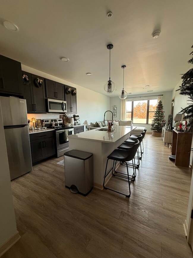 6408 Bridge Rd, Unit The Current 2 Apt 456 in Monona, WI - Building Photo - Building Photo